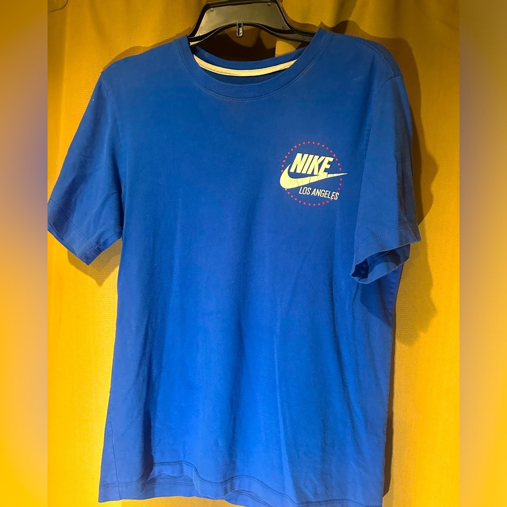 Small women’s blue Nike T Shirt